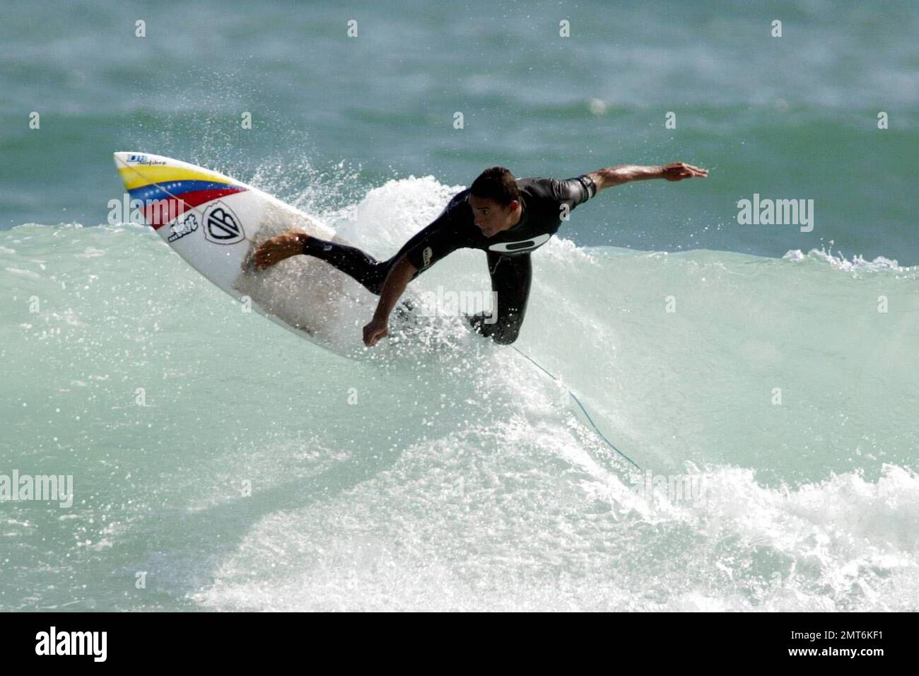 Surfers take part in the Oakley Gang Challenge surf contest at Santa ...