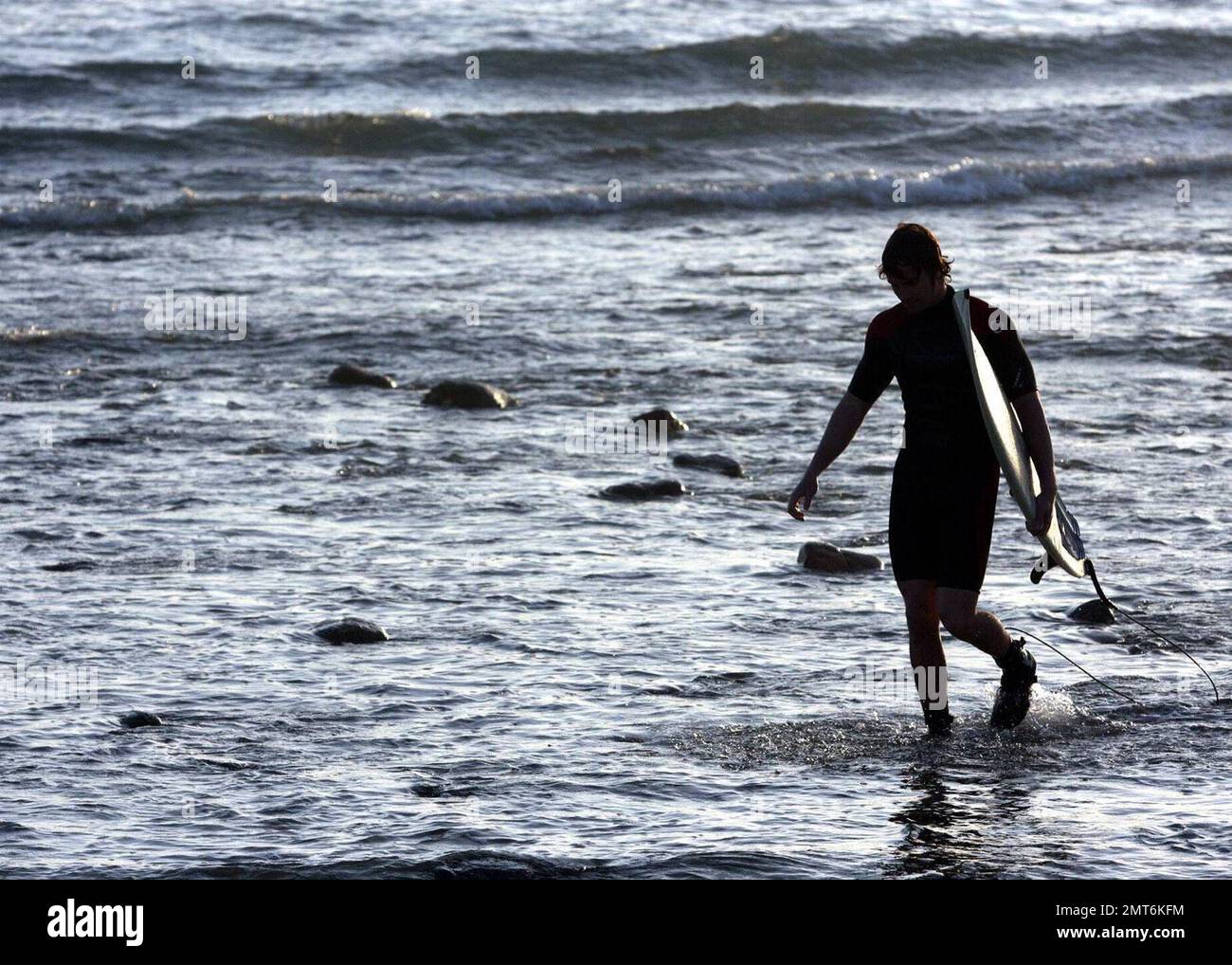 Surfers take part in the Oakley Gang Challenge surf contest at Santa ...
