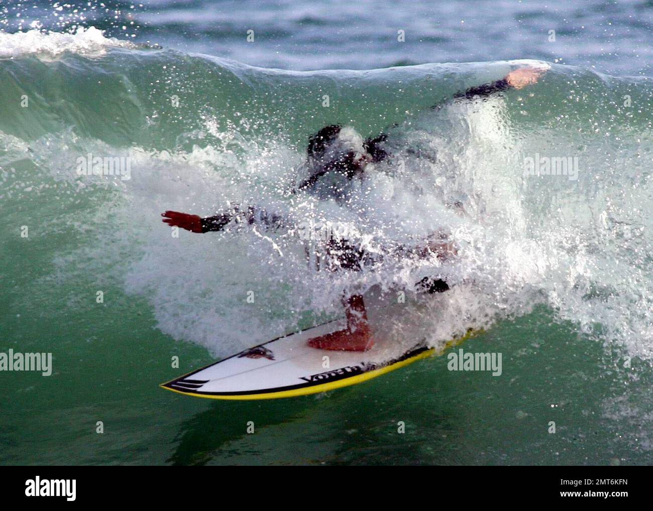 Surfers take part in the Oakley Gang Challenge surf contest at Santa ...