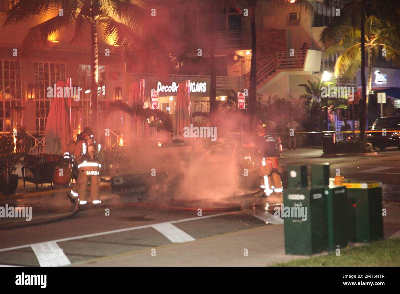 General views of a taxi that lit on fire on the famed Ocean Drive