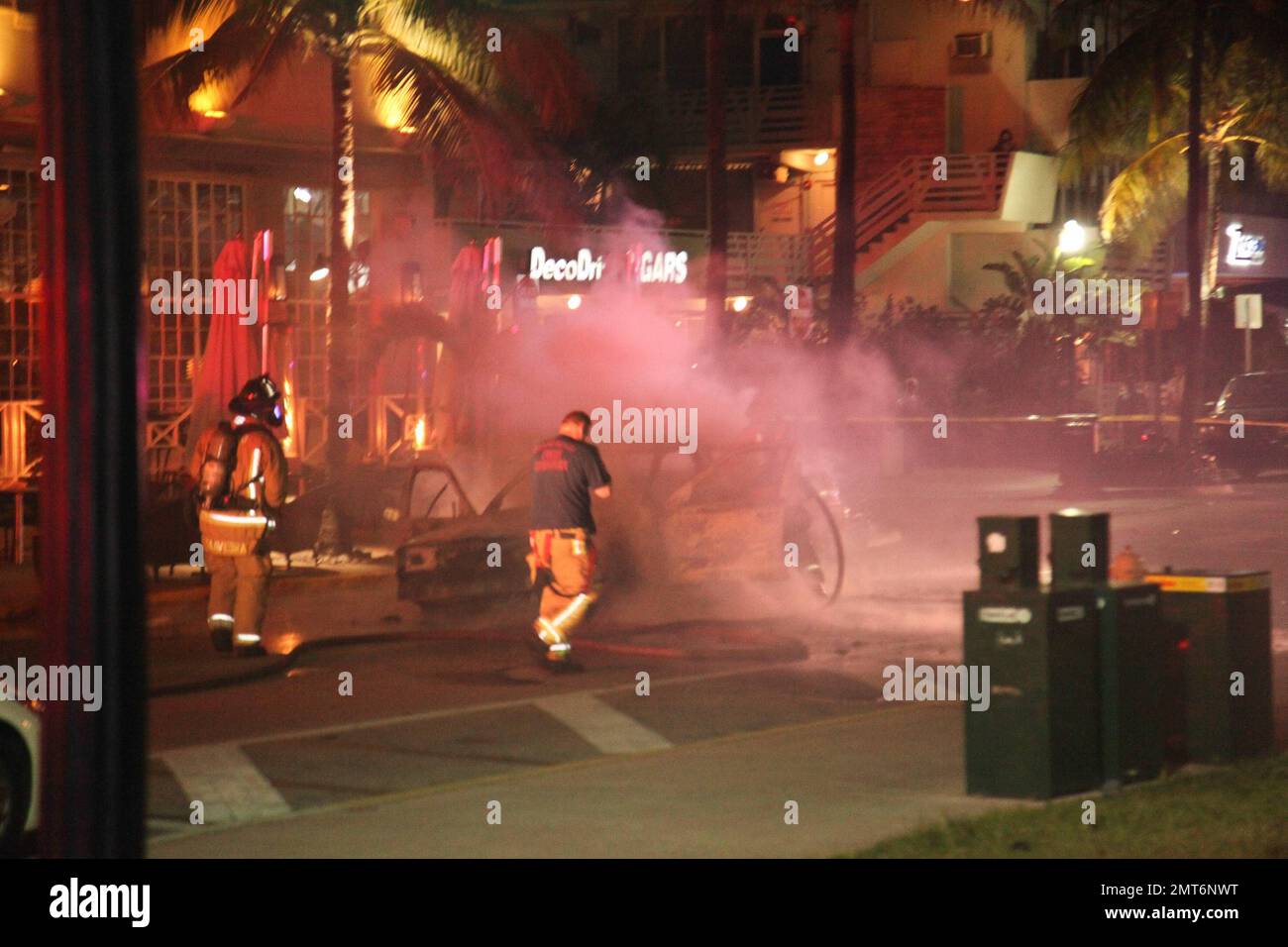 General views of a taxi that lit on fire on the famed Ocean Drive