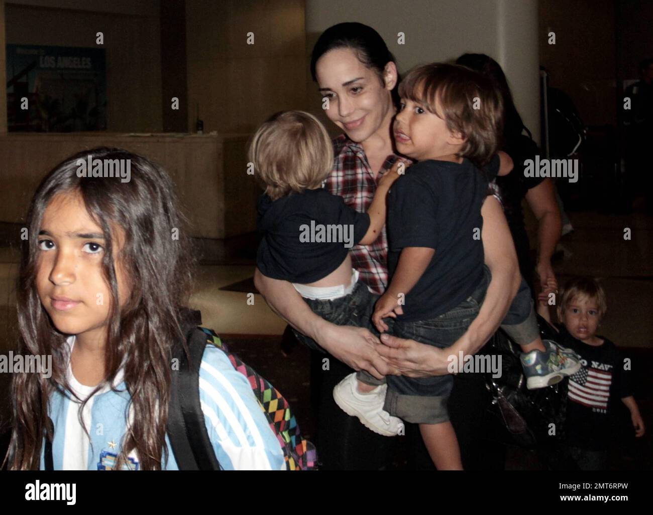 EXCLUSIVE!! Nadya Suleman (aka Octomom) arrives at LAX with her large ...