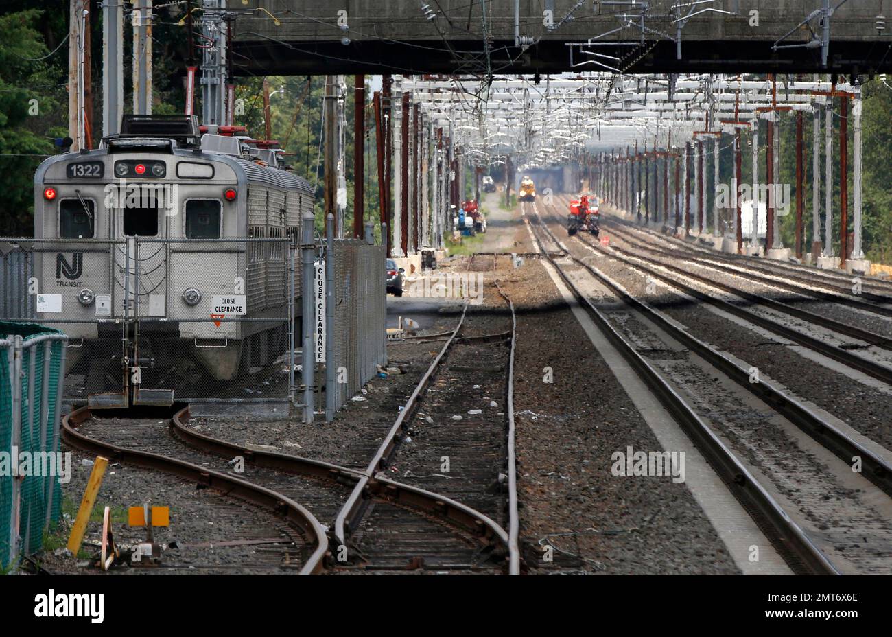 The sidelined Princeton Dinky train, left, idles to the side of the