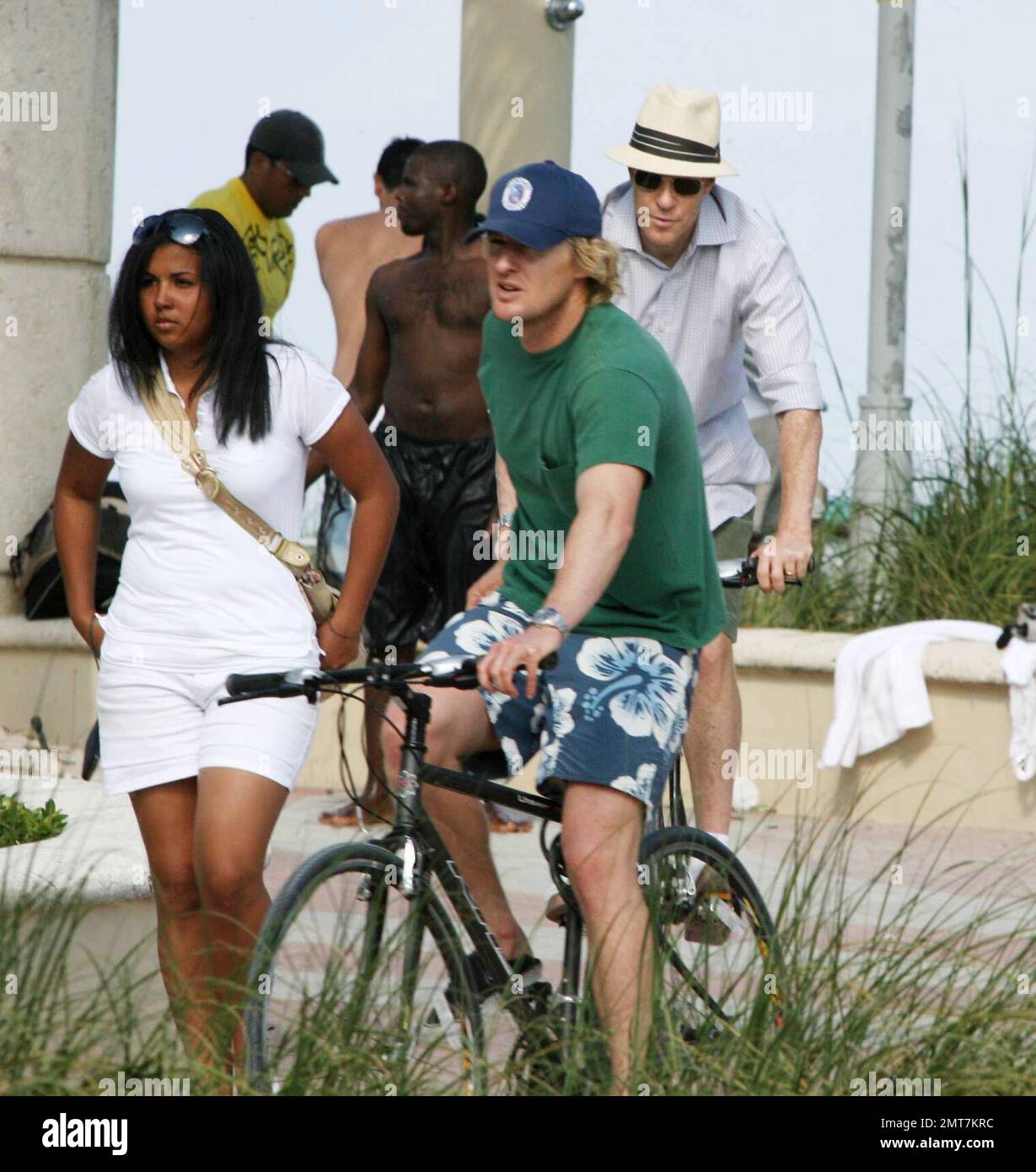 Exclusive!!  Owen Wilson and Vince Vaughn take a Sunday afternoon bike ride along the Miami Beach boardwalk.  The Wedding Crashers buddies also stopped at the Miami Beach Polo World Cup where they chatted to a few ladies in the crowd.  Miami, FL 4/27/08 Stock Photo