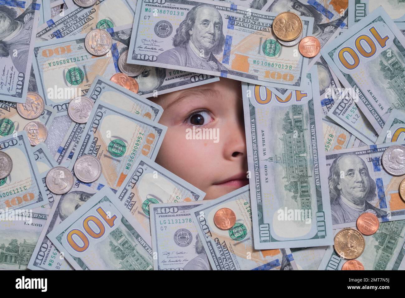 Money and banking. Kids how to be rich. Child with dollar bills near face.  Financial independence and ability to earn a lot of money Stock Photo -  Alamy