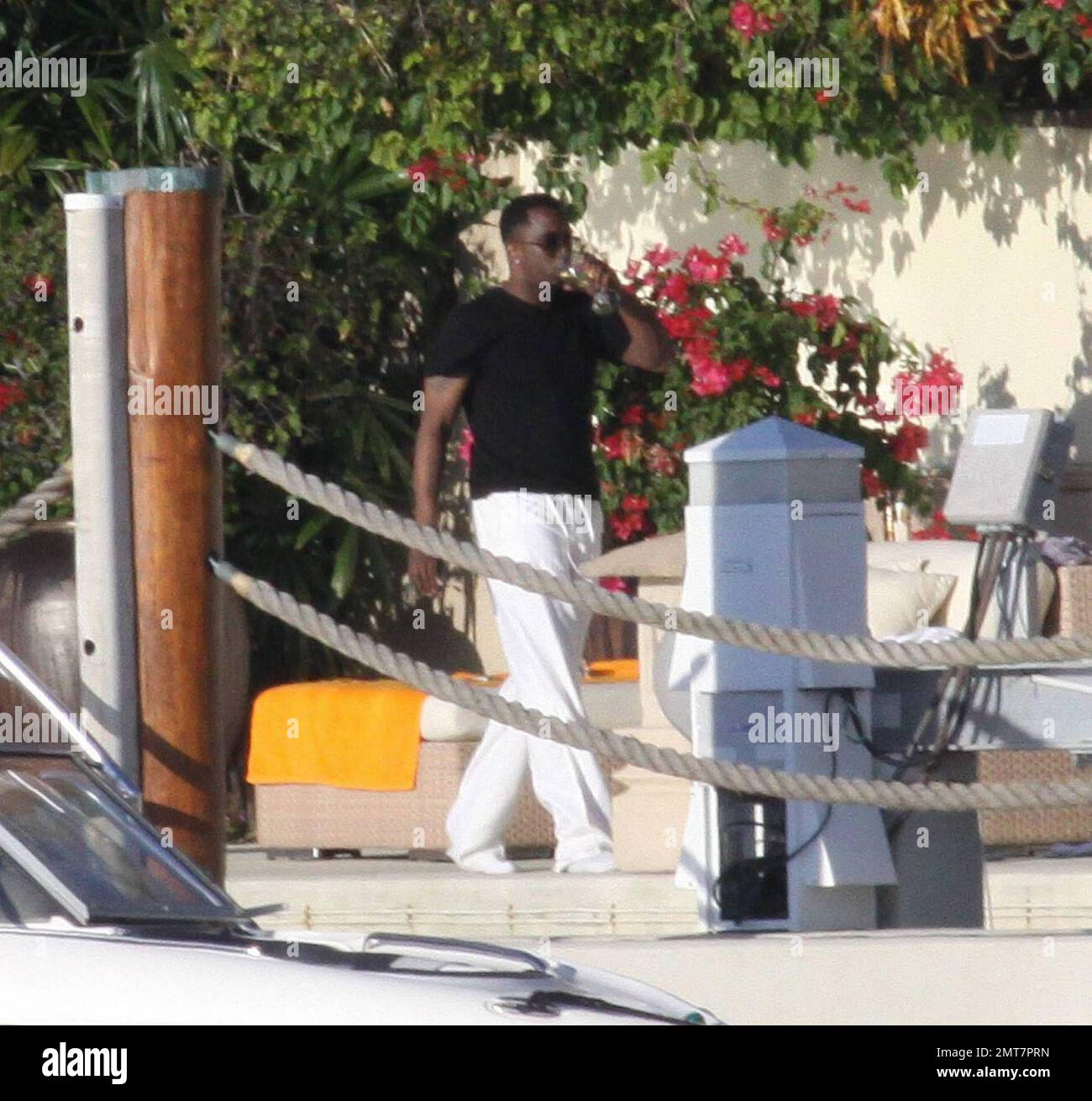 - EXCLUSIVE!! Hip Hop mogul Sean P Diddy Combs enjoys a glass of wine ...