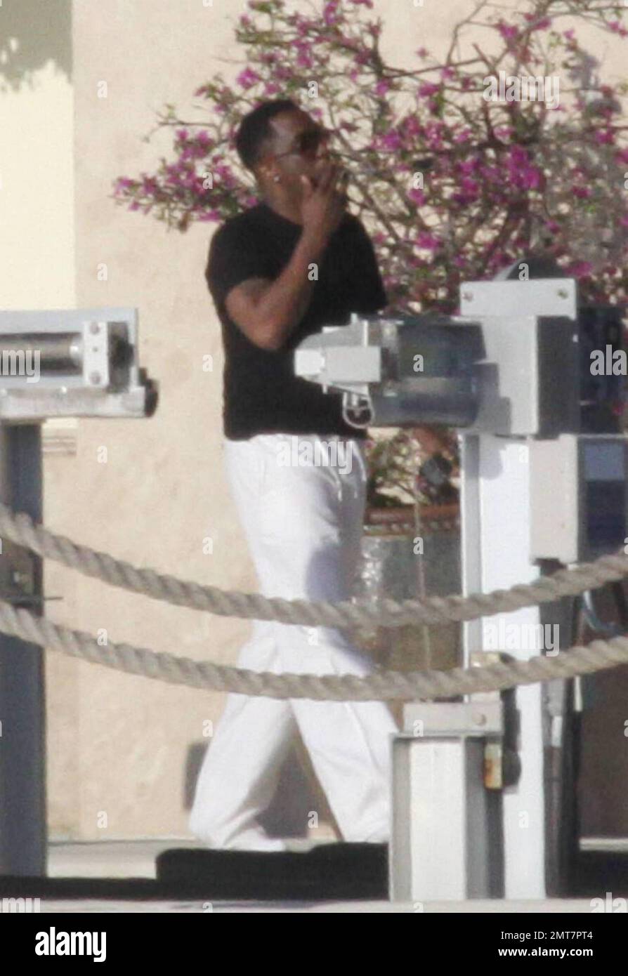 - EXCLUSIVE!! Hip Hop mogul Sean P Diddy Combs enjoys a glass of wine ...