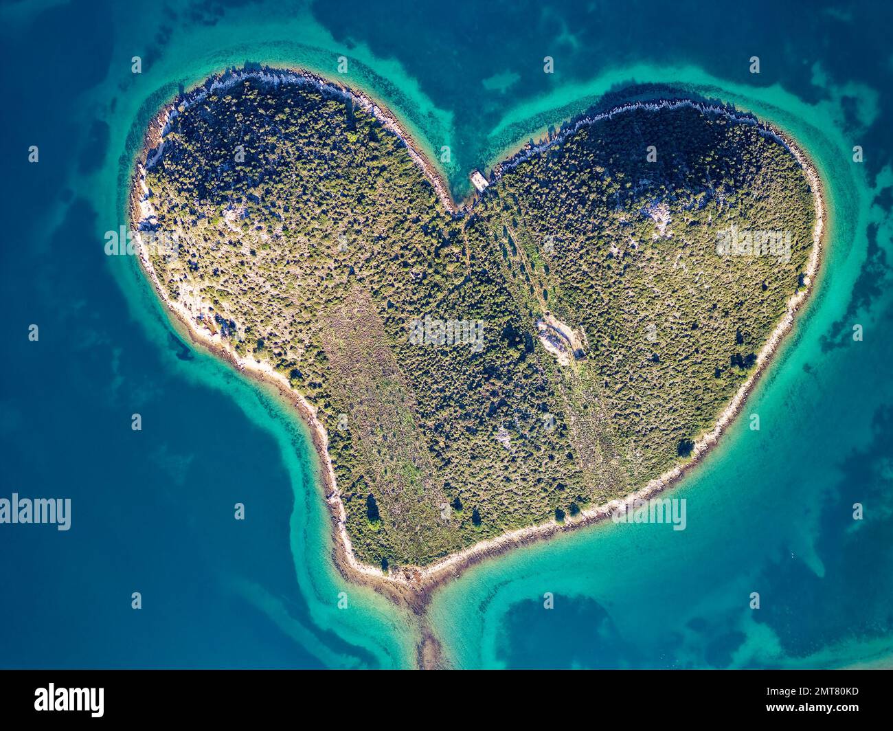 Aerial drone view of Galesnjak the Island of Love in Croatia with beautiful blue turquoise sea water. Heart shaped Island. Travel and holidays. Stock Photo