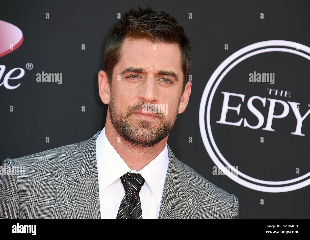 NFL football player Aaron Rodgers, of the Green Bay Packers, arrives at