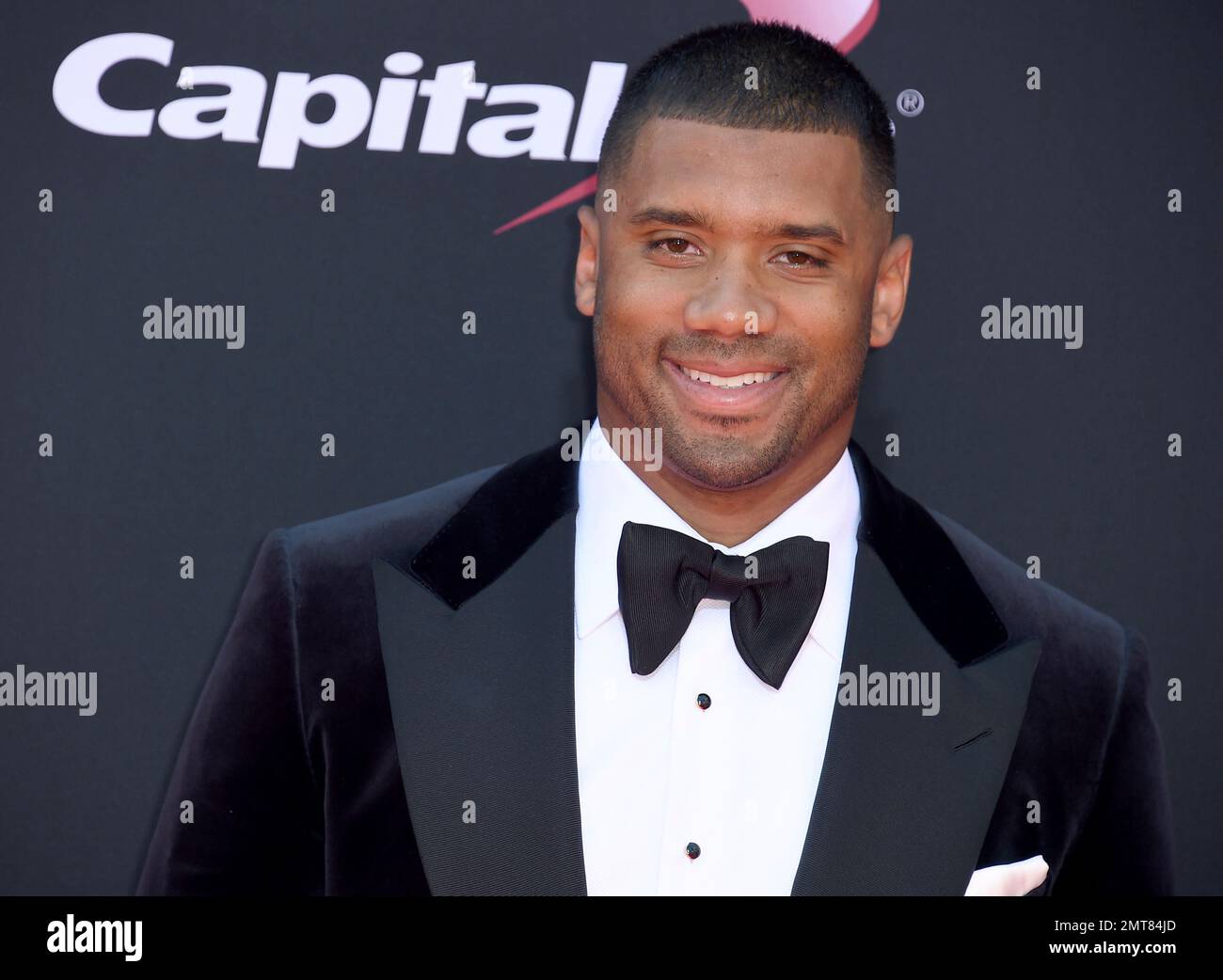 NFL football player Russell Wilson, of the Seattle Seahawks, arrives at