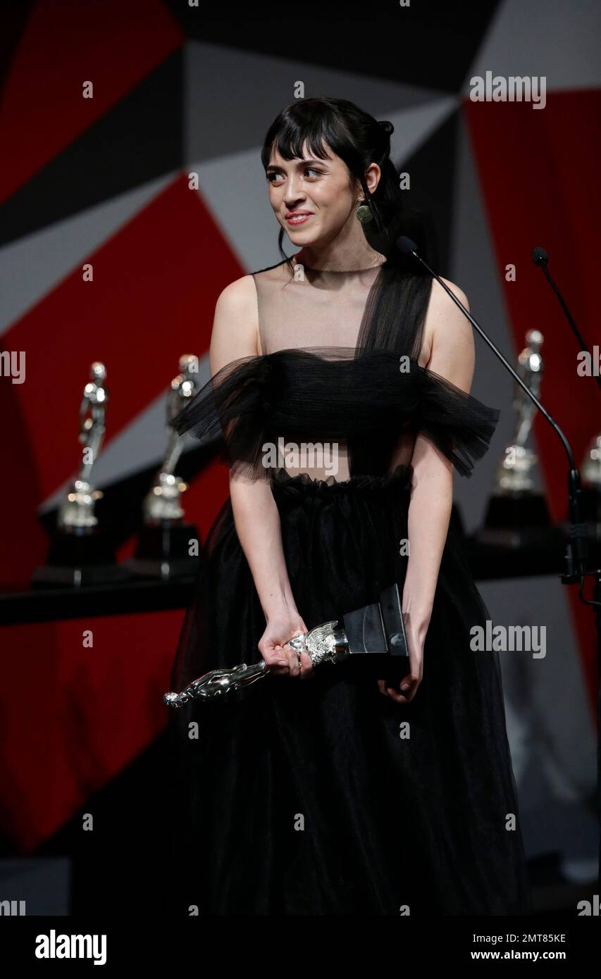 Maria Evoli reacts as she receives the best new actress award for Tenemos  la Carne during the 59th Ariel Awards at the Palace of Fine Arts in Mexico  City, Tuesday, July 11,
