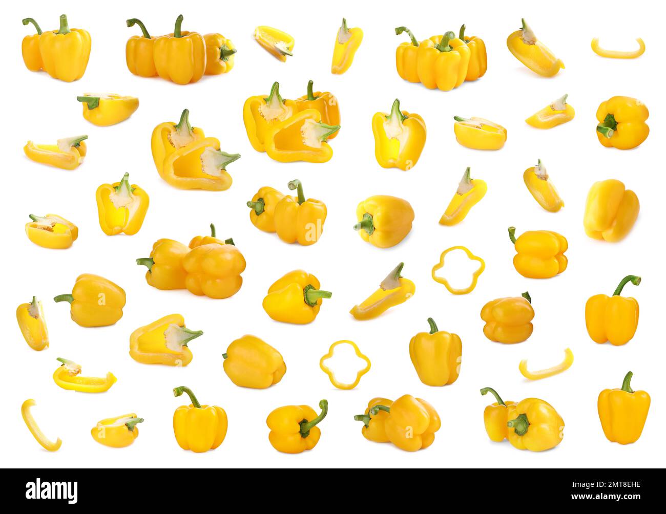 Set of ripe yellow bell peppers on white background Stock Photo - Alamy