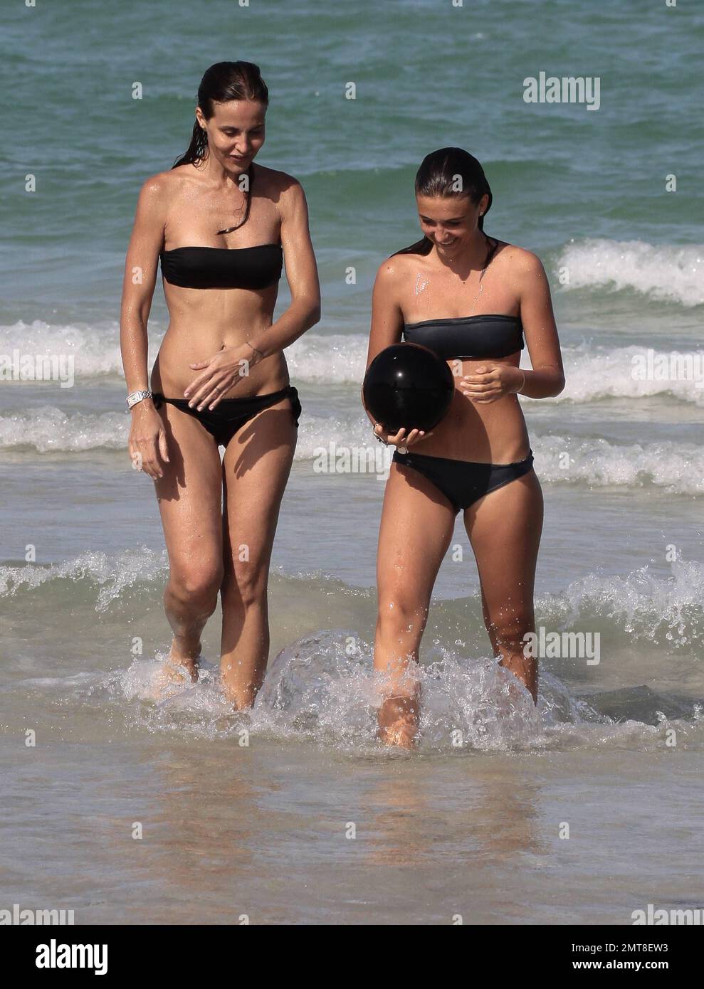 Former soccer player Paolo Maldini along with wife Adriana Fossa and their  sons Christian and Daniel were spotted spending the day at the beach with  friends and family. The group were seeing