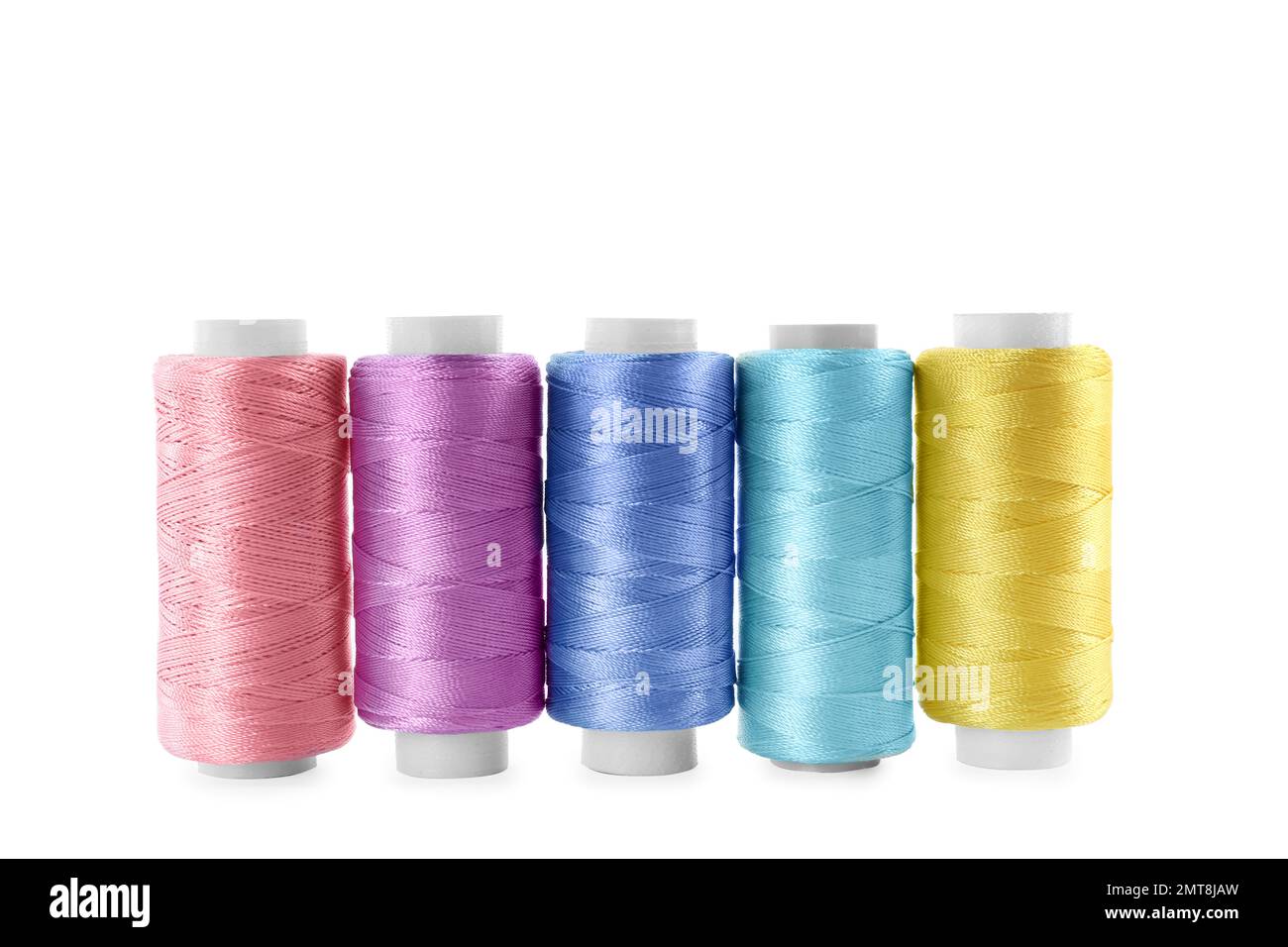 Set of color sewing threads isolated on white Stock Photo - Alamy