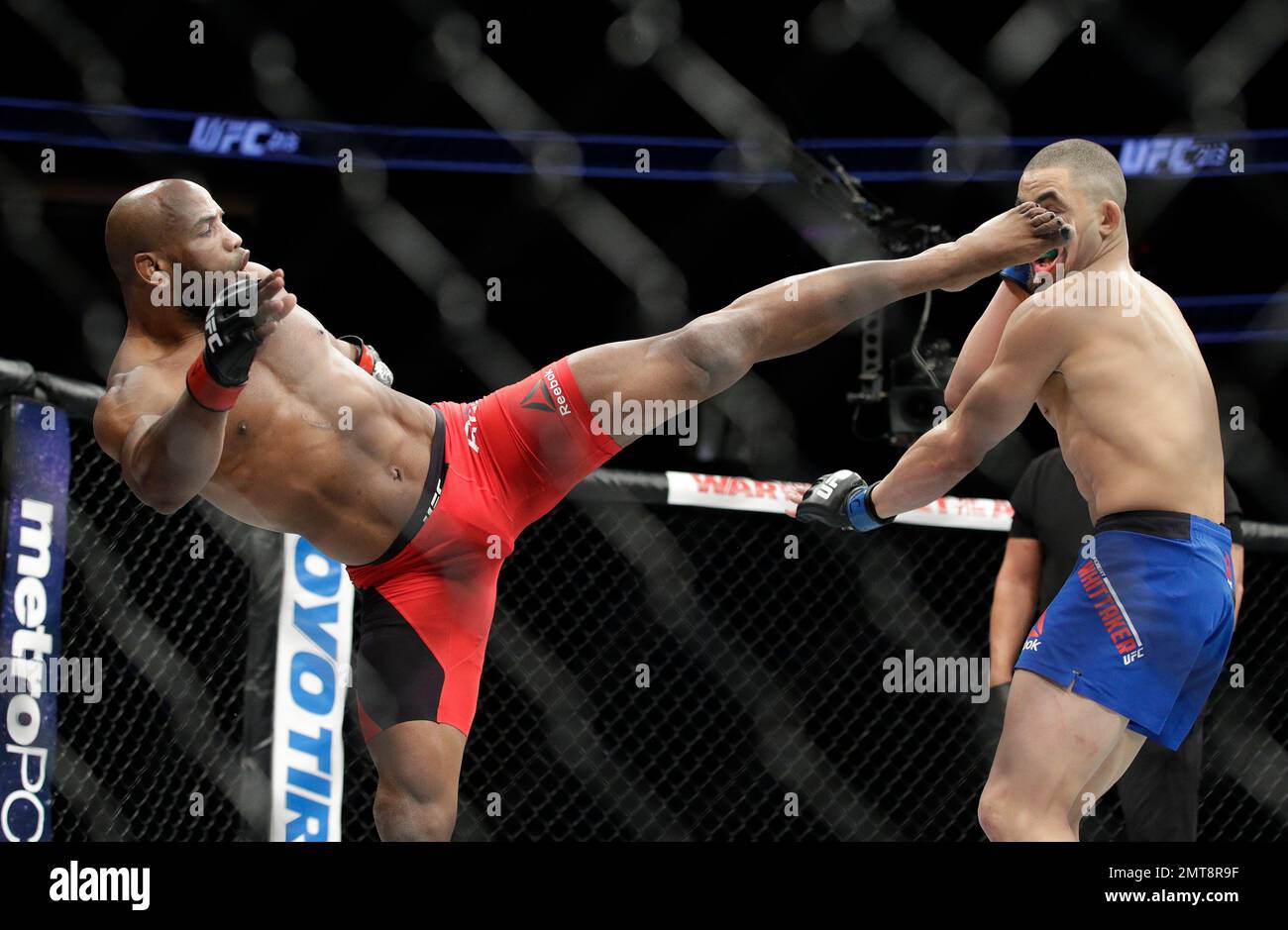 Yoel Romero kicks Robert Whittaker during a middleweight championship mixed  martial arts bout at UFC 213, Saturday, July 8, 2017, in Las Vegas. (AP  Photo/John Locher Stock Photo - Alamy