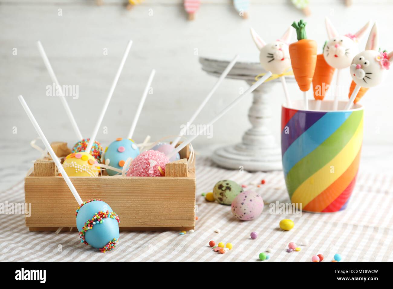 Different delicious sweet cake pops on table. Easter holiday Stock Photo