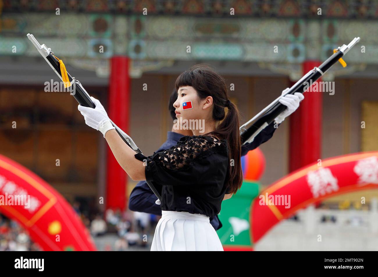 Senior high school students perform during the military honor guard ...