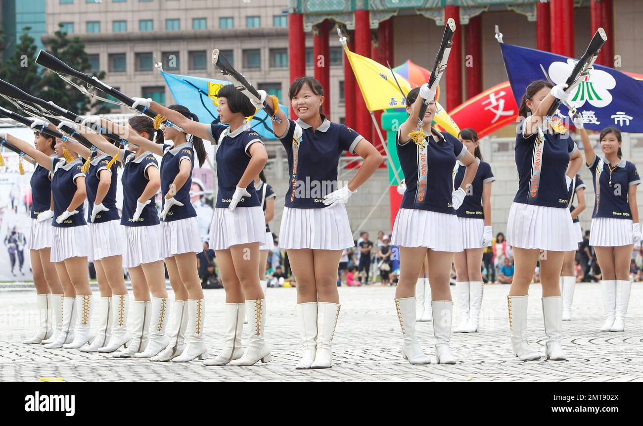 Senior high school students perform during the military honor guard ...