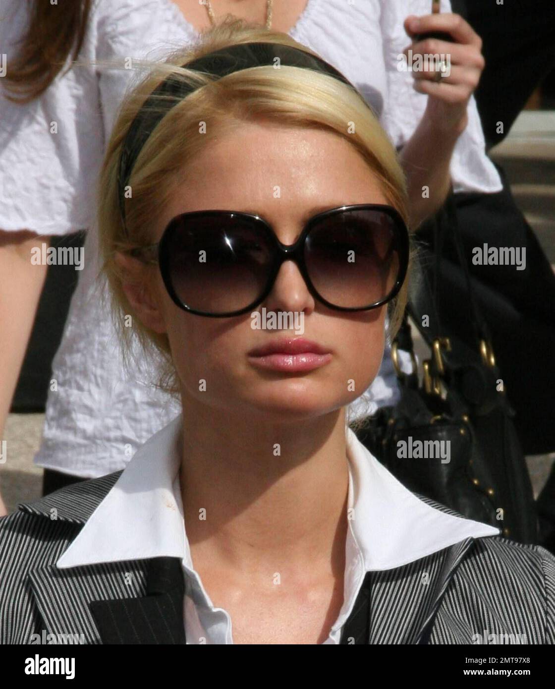 Paris Hilton broke down in tears today as she left a downtown Los