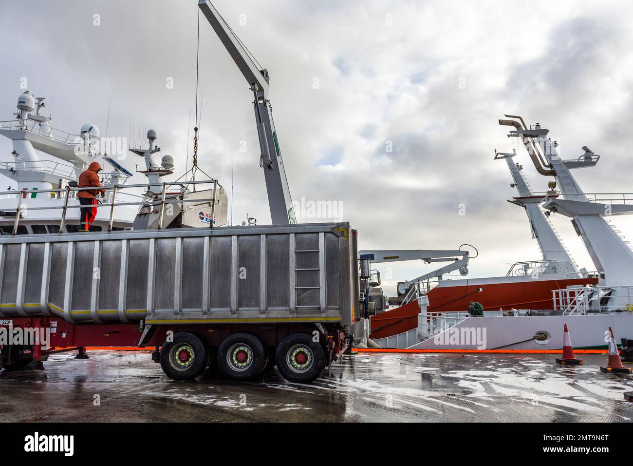 Unloading fish from ANTARCTIC super trawler in Killybegs, County Donegal, Ireland. Stock Photo