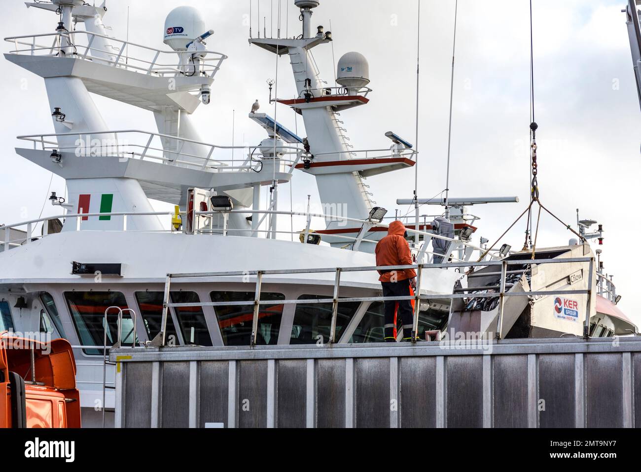 Unloading fish from ANTARCTIC super trawler in Killybegs, County Donegal, Ireland. Stock Photo