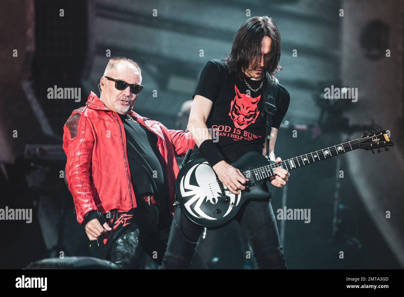 STADIO OLIMPICO, TURIN, ITALY: Vince Pastano (R), guitarist of the Italian rocker Vasco Rossi (L), performing live on stage for the “LIVE KOM” tour Stock Photo