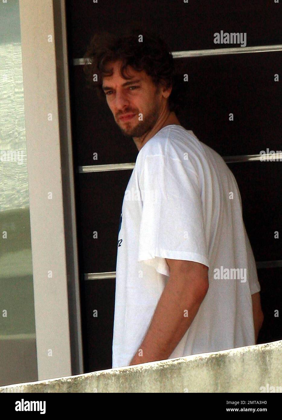 A day after winning the NBA Championship, Lakers center Pau Gasol dresses down and leaves his home to run some errands, carrying along some dress shirts. Redondo Beach, CA. 6/18/10. . Stock Photo