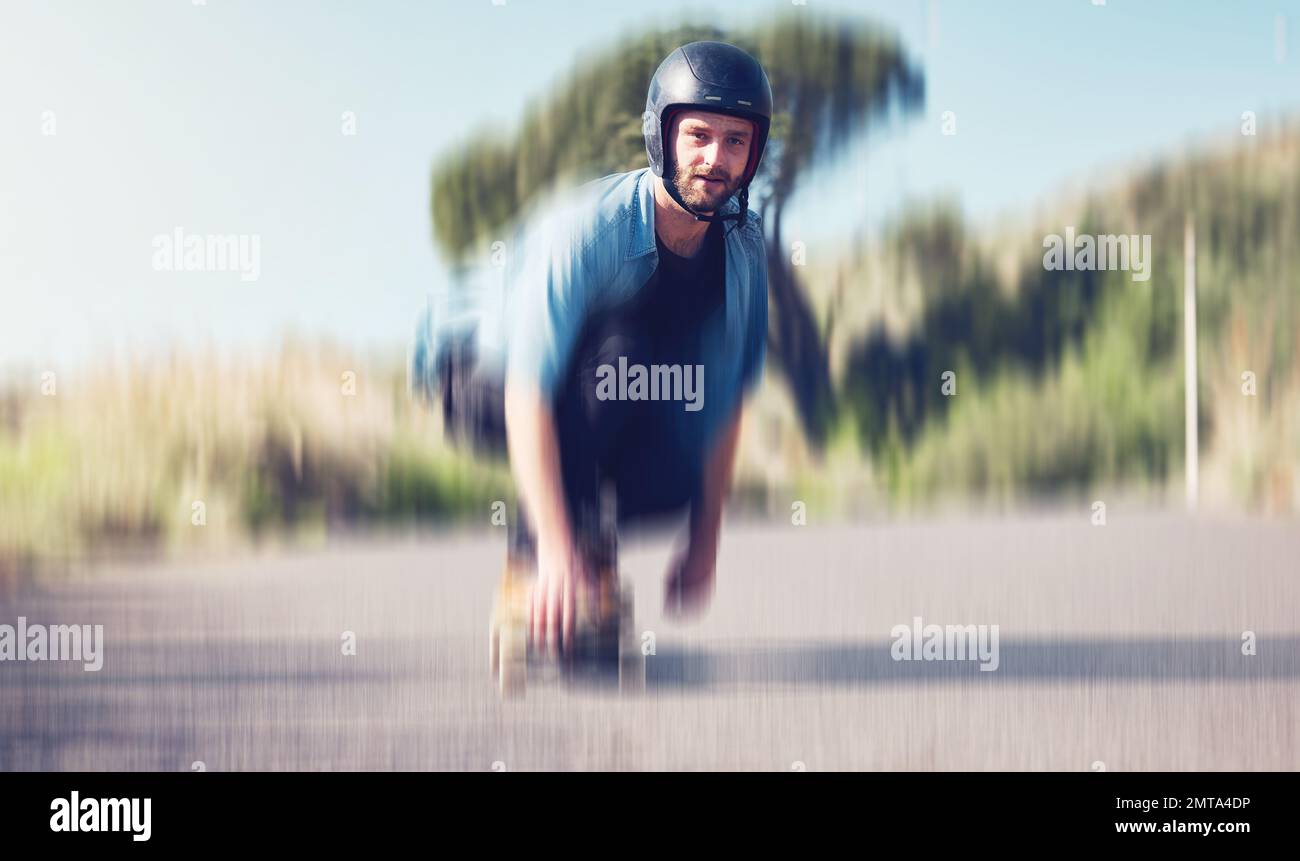 Skater, motion blur and speed with a sports man skating on an asphalt