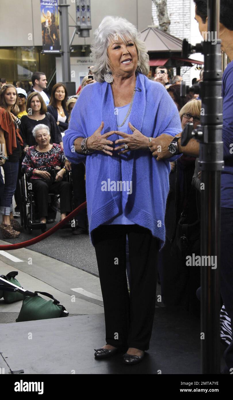 https://c8.alamy.com/comp/2MTA7YE/celebrity-cook-paula-deen-is-joined-by-husband-michael-groover-as-she-makes-an-appearance-at-the-grove-for-an-interview-with-mario-lopez-paula-was-recently-named-hottest-female-chef-by-maxim-magazine-and-announced-last-night-on-the-tonight-show-that-she-will-soon-have-her-own-clothing-line-los-angeles-ca-25th-october-2011-2MTA7YE.jpg