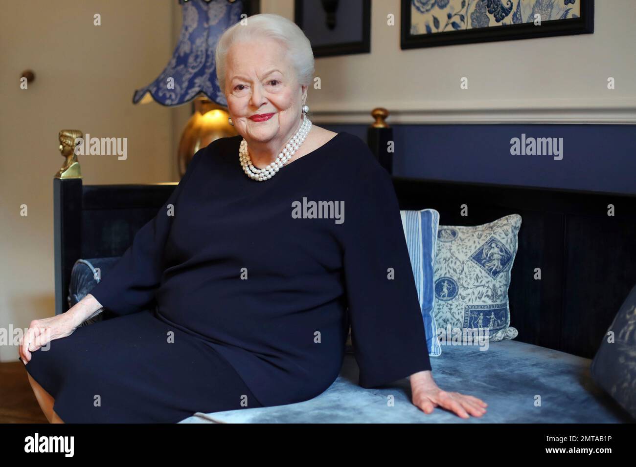 FILE - In this June 18, 2016 file photo, U.S. actress Olivia de Havilland  poses during an Associated Press interview, in Paris. de Havilland is  launching her own sequel to the TV, image size:1300x956