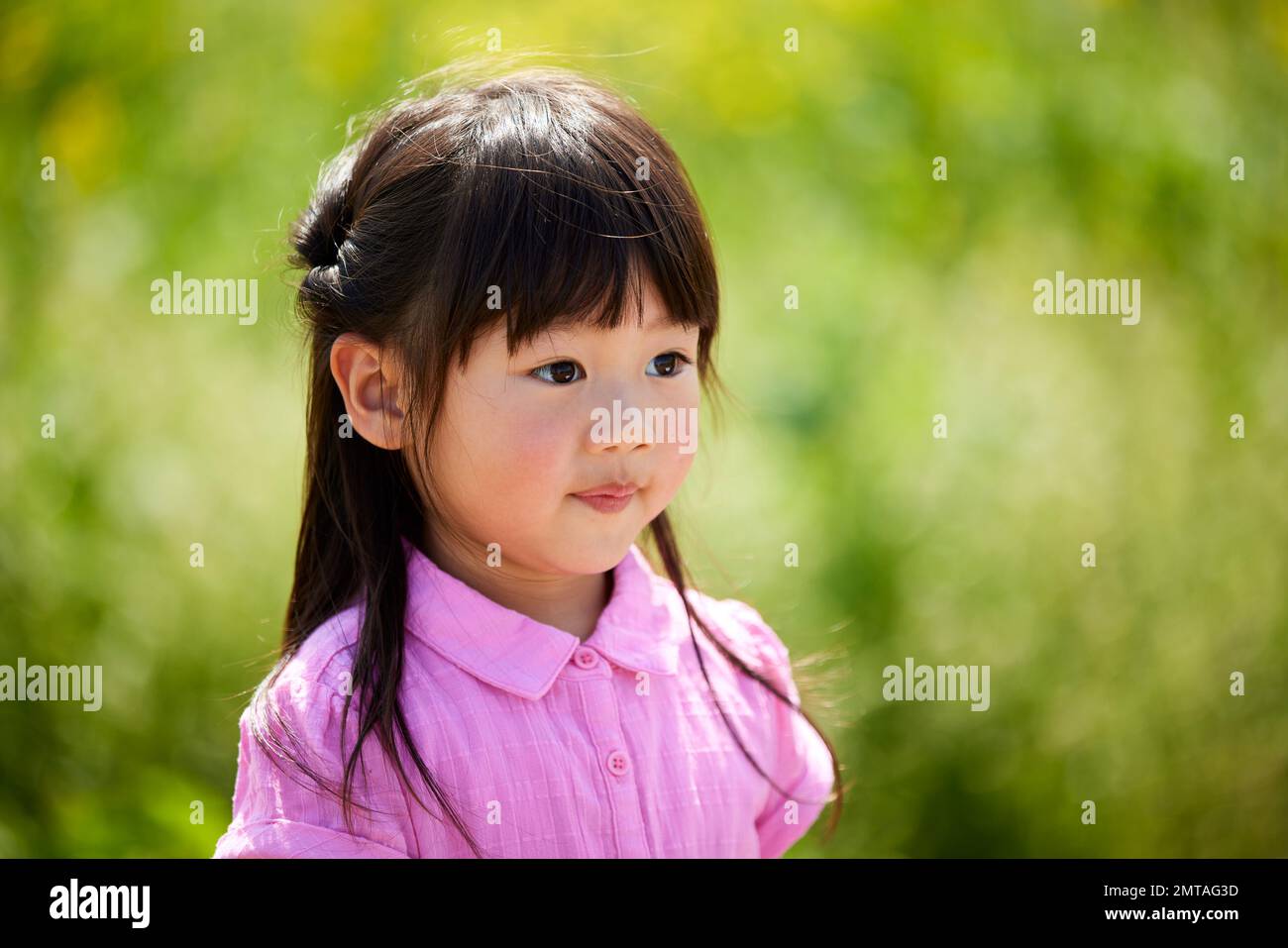 Japanese kid portrait in a city park Stock Photo