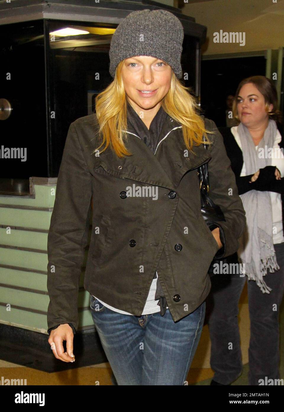 Laura Prepon arrives at the premiere of 'Peach Plum Pear' held at Regent Showcase Cinema during the Hollywood Reel Film Festival.  'Peach Plum Pear' stars Alanna Masterson, sister of 'That '70s Show' actor Danny Masterson. Los Angeles, CA. 12/16/10. Stock Photo