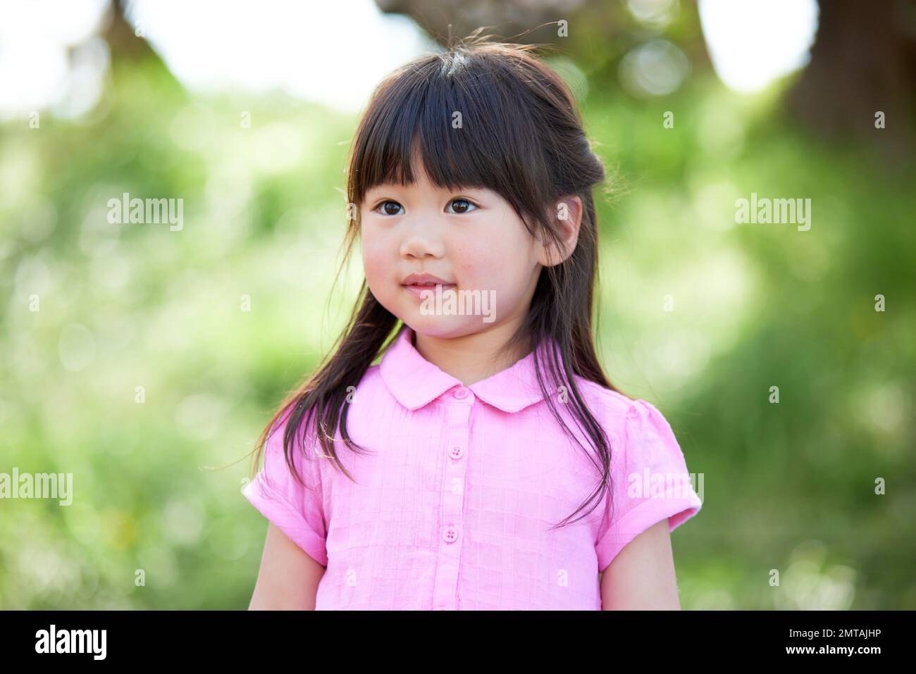 Japanese kid portrait in a city park Stock Photo