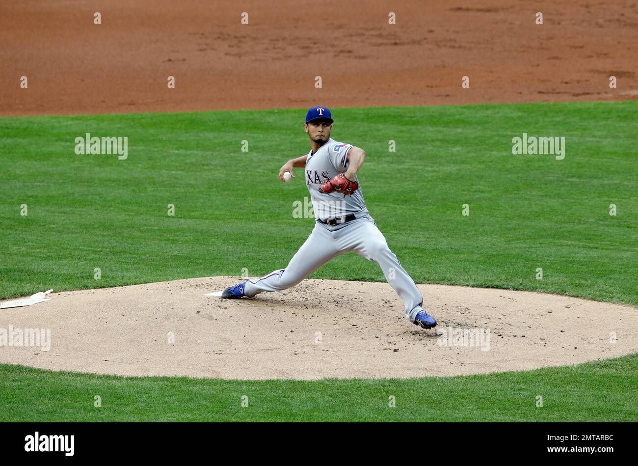 Texas Rangers starting pitcher Yu Darvish delivers in the first inning ...