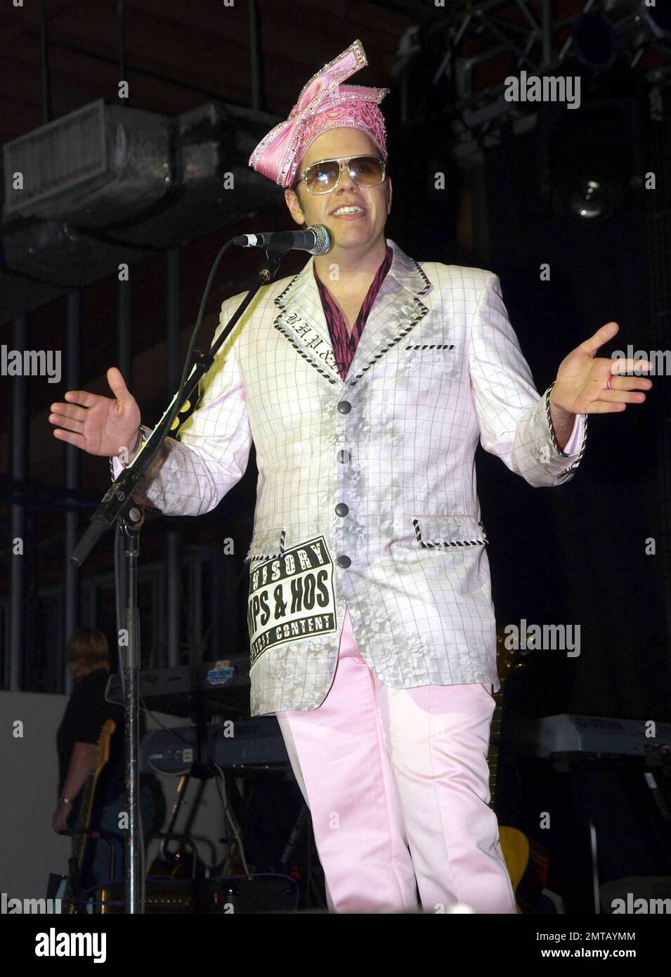 Perez Hilton is a vision in pink as he arrives for his event during the South by Southwest music festival. He donned a pink hat reminiscent of Aretha Franklin's at the Presidential Inauguration along with a pink jacket that had a parental advisory warning for 'Pimps & Hos.' Austin, TX. 3/22/09. Stock Photo