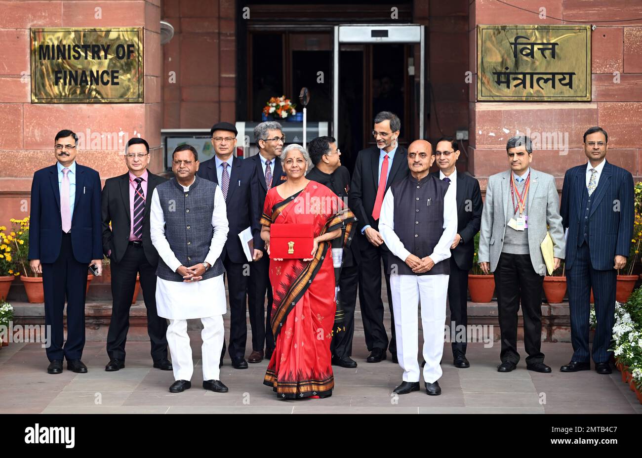 NEW DELHI, INDIA - FEBRUARY 1: Union Finance Minister Nirmala Sitharaman with Ministers of State Bhagwat Kishanrao Karad and Pankaj Chaudhary and officials poses for photographs outside the Finance Ministry ahead of the presentation of the Union Budget 2023-24 at North Block on February 1, 2023 in New Delhi, India. (Photo by Ajay Aggarwal/Hindustan Times/Sipa USA) Stock Photo