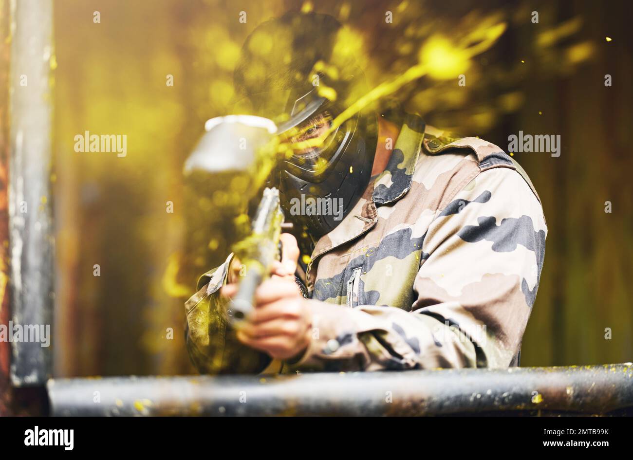 Paintball, soldier and camouflage with a sports man playing a military ...