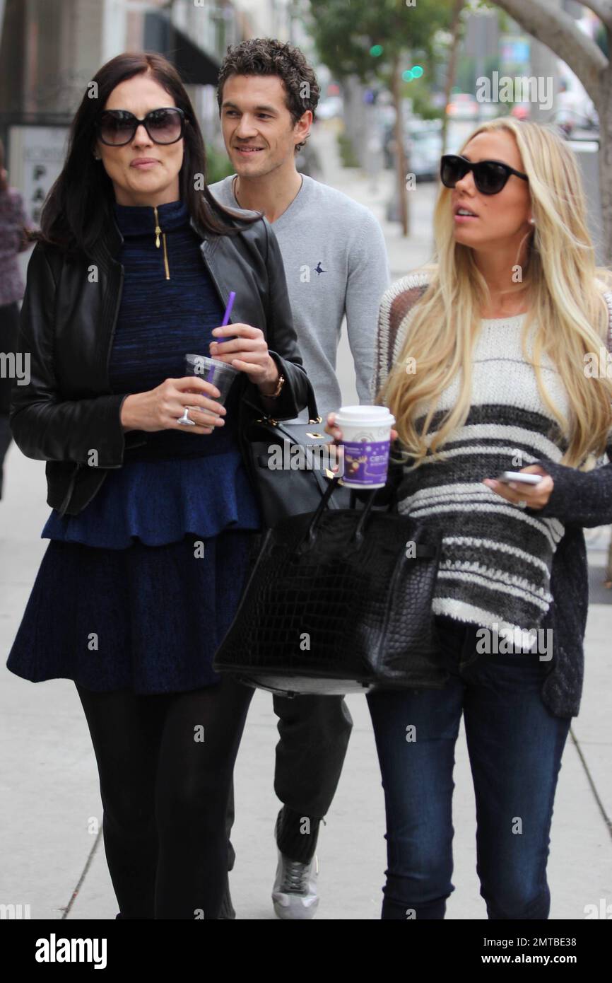 Hiding her growing baby bump under a baggy grey sweater, Petra Ecclestone was spotted running errands in West Hollywood. Reports indicate that the 23 year old billionaires is five months pregnant with husband James Stunt. Los Angeles, CA. 15th November 2012. Stock Photo