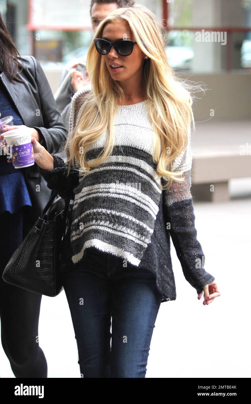 Hiding her growing baby bump under a baggy grey sweater, Petra Ecclestone was spotted running errands in West Hollywood. Reports indicate that the 23 year old billionaires is five months pregnant with husband James Stunt. Los Angeles, CA. 15th November 2012. Stock Photo