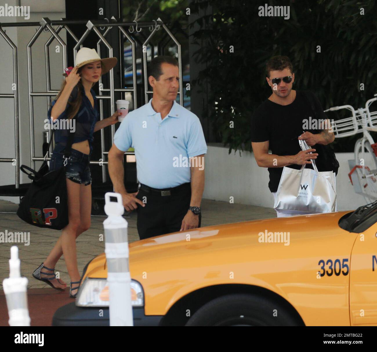 Ryan Phillippe and Paulina Slagter get in a taxi as they head out on the town for an afternoon in South Beach. Miami Beach, FL. 13th June 2014. Stock Photo