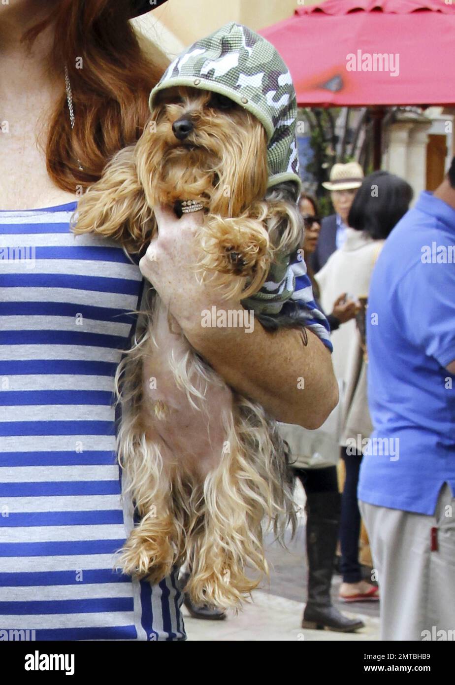 Phoebe Price wears a blue outfit as she poses for photos at The Grove