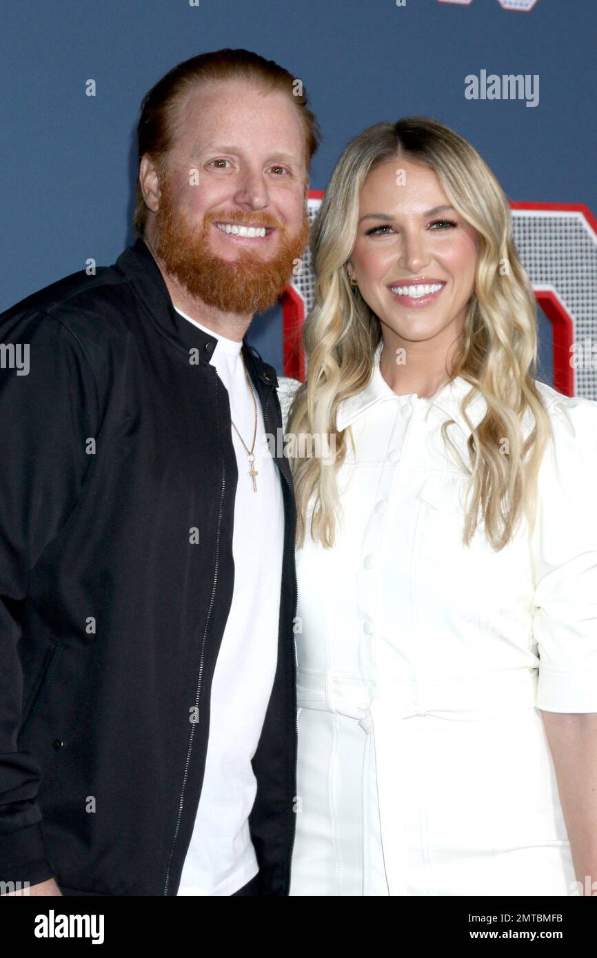 LOS ANGELES - JAN 31:  Justin Turner, Kourtney Pogue at the 80 for Brady Los Angeles Premiere at the Village Theater on January 31, 2023 in Westwood, CA Stock Photo