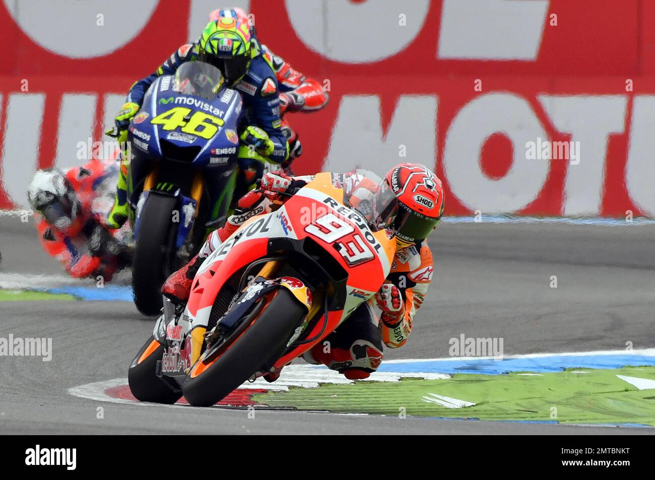 Moto GP rider Marc Marquez of Spain, right, takes a curve followed by Moto GP rider Valentino Rossi of Italy during the Dutch Motorcycle Grand Prix, in Assen, Northern Netherlands, Sunday, June