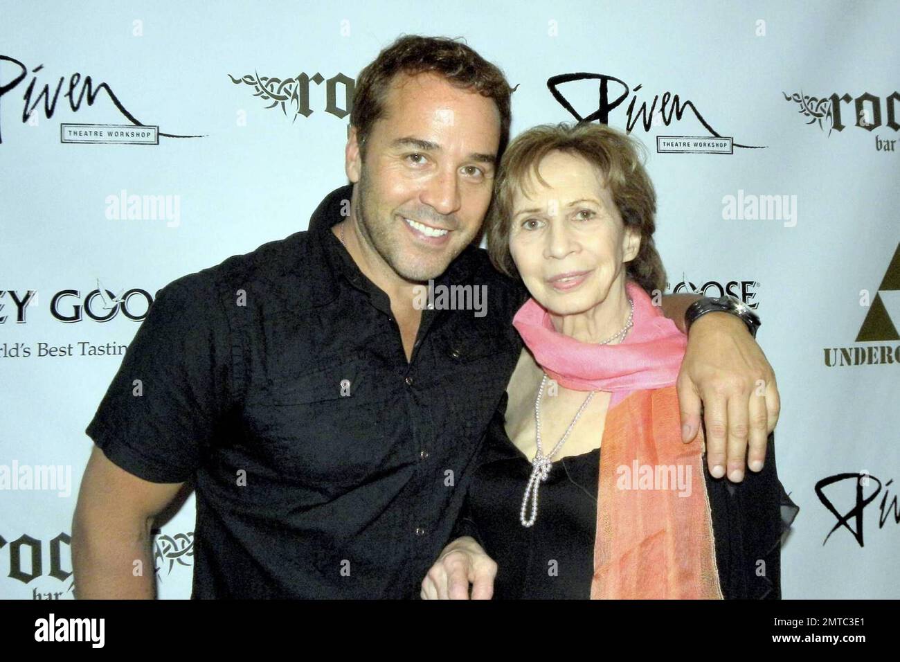 Actor Jeremy Piven, his mother Joyce Piven and Rockit Bar and Grill owner Billy Dec are among the attendees at a live auction benefiting the Piven Theatre Workshop, founded by Piven's parents, Joyce and Byrne, over 30 years ago. The event raised an estimated $115,000 which will provide scholarships for patrons to attend the theatre company's training center for children and adults. Famous alumni include Jeremy Piven, John Cusack, Joan Cusack, Aidan Quinn, Lili Taylor, and Kate Walsh. Among the auction items was a chance to appear on Jeremy's HBO show 'Entourage.' Chicago, IL. 6/21/09. . Stock Photo