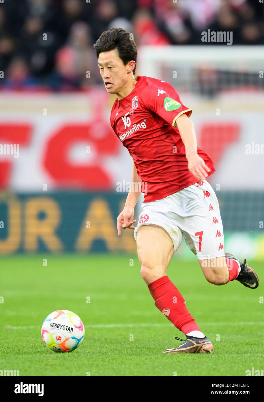 Jae-Sung LEE (MZ) action, soccer 1st Bundesliga, 18th matchday, FSV FSV FSV Mainz 05 (MZ) - VfL Bochum (BO) 5: 2, on January 28th, 2023 in Mainz/ Germany. #DFL regulations prohibit any use of photographs as image sequences and/or quasi-video # Stock Photo