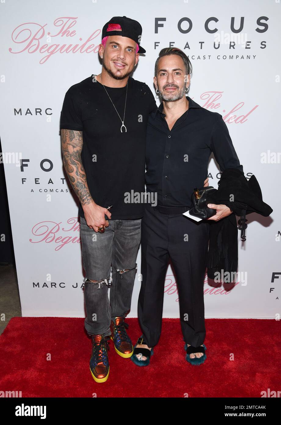 Fashion designer Marc Jacobs, right, and boyfriend Char Defrancesco attend  the premiere of Focus Features' The Beguiled at Metrograph on Thursday,  June 22, 2017, in New York. (Photo by Evan Agostini/Invision/AP Stock