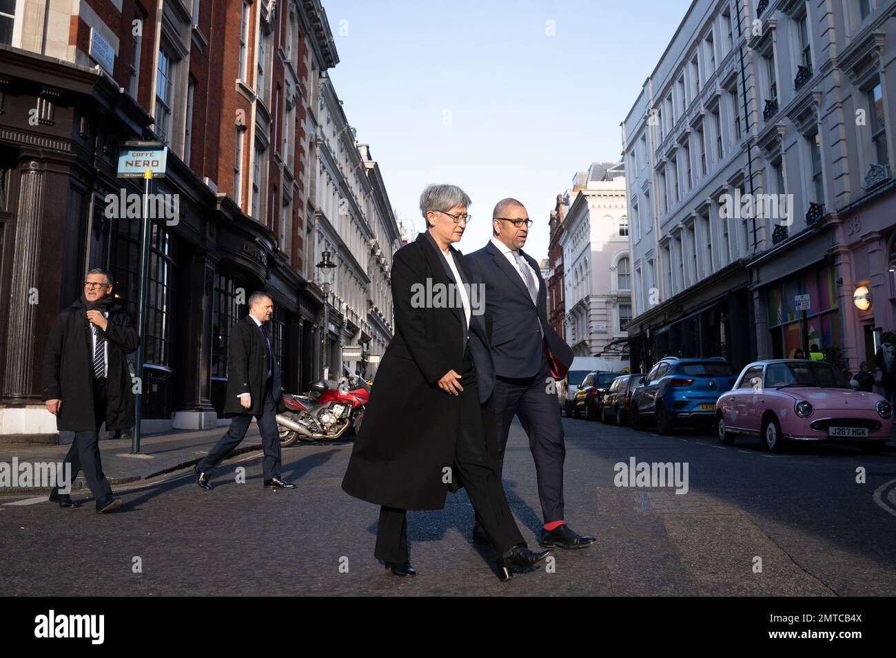 Foreign Secretary James Cleverly and Australian foreign minister Penny Wong walk through central London on their way to Australia House after holding a meeting at the Foreign Secretary's official residence at Carlton Gardens in London. Picture date: Wednesday February 1, 2023. Stock Photo