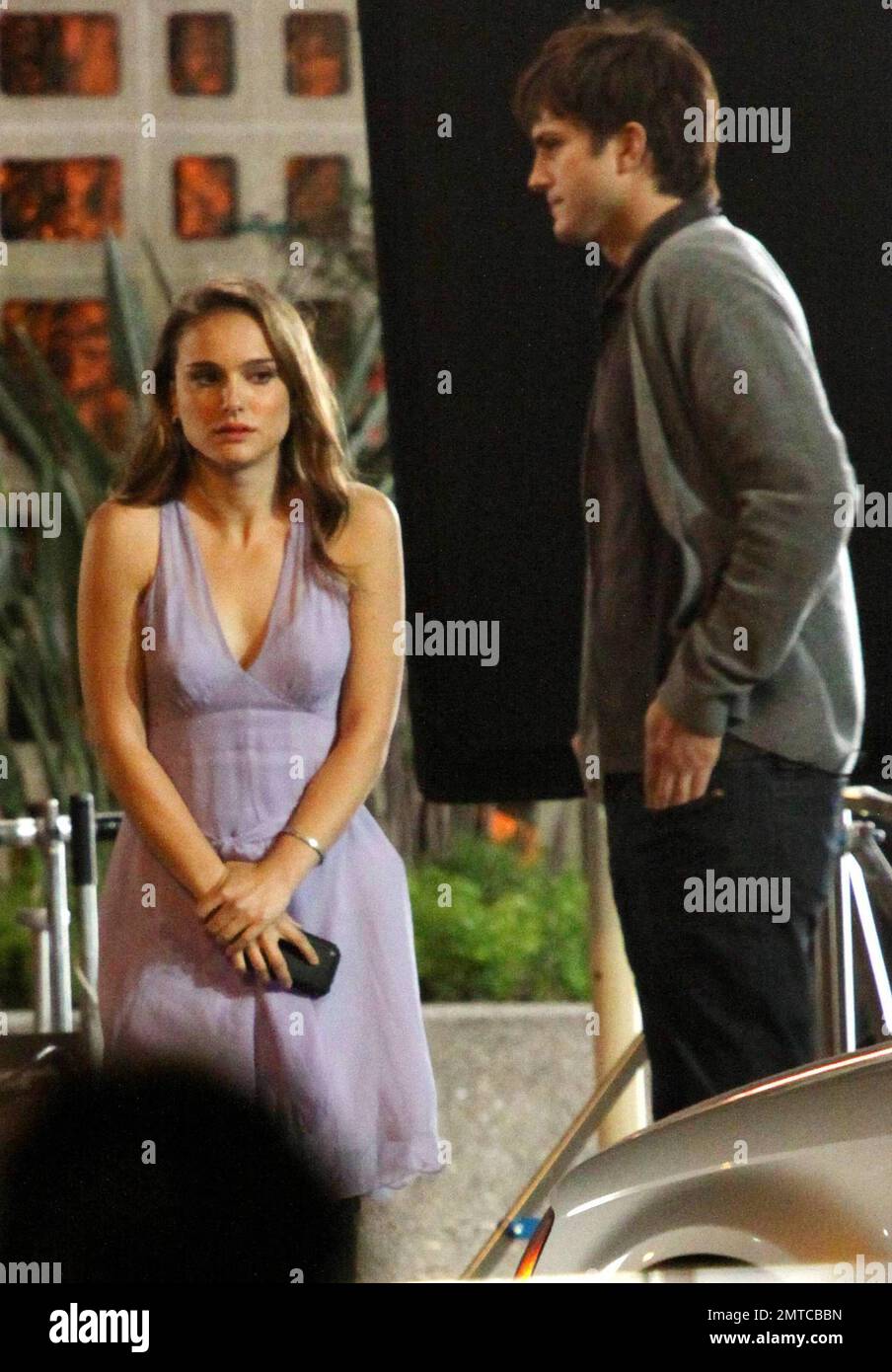 Actress Natalie Portman appears very cold as she and actor Ashton