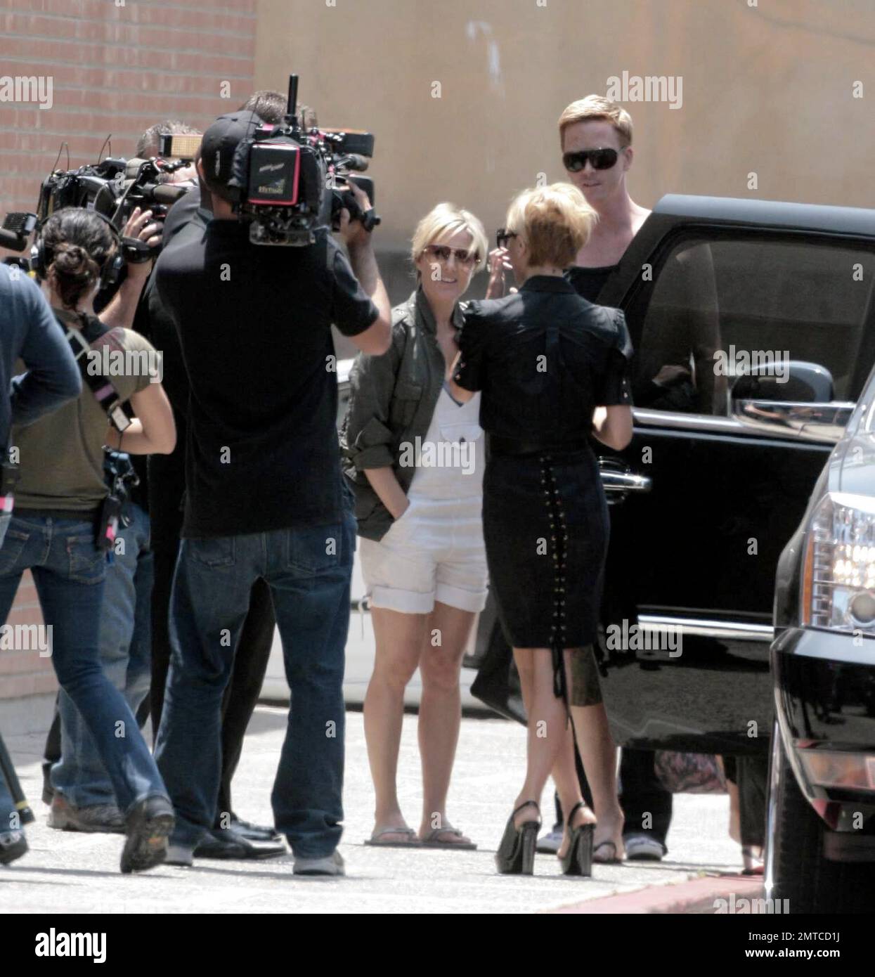 Victoria Beckham has been a naughty girl! Posh got into trouble with a US cop today while filming her reality tv show stateside. She was pulled over  in her Escalade SUV and was cited and reprimaned for driving on a British license. After being ticketed, she paid a visit to the DMV in Santa Monica, Calif. where she had to take a written test to get her Caliornia License. Luckily for Posh she passed but she still had her driver take her home. 5/22/07. Stock Photo