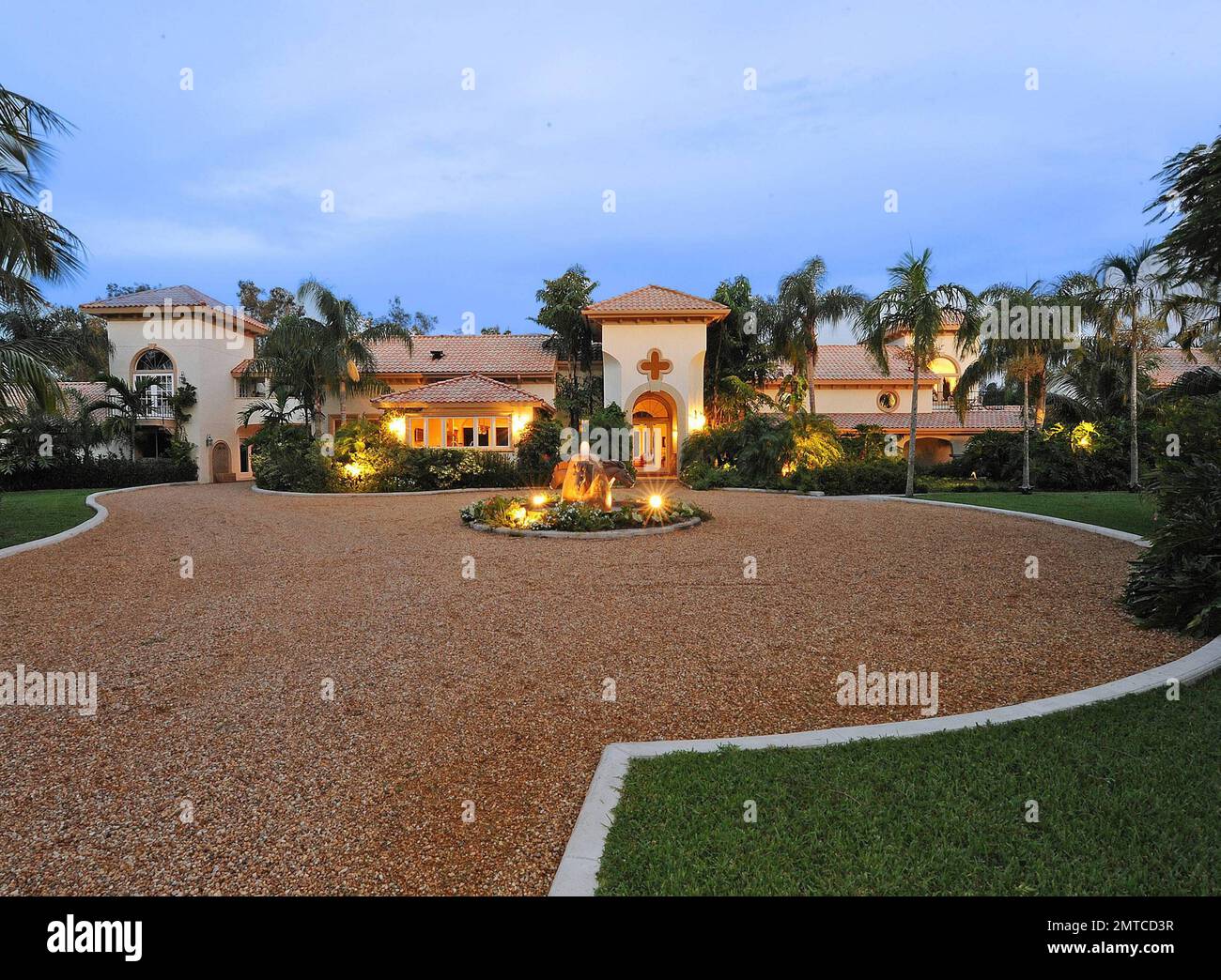 EXCLUSIVE!! Pop star Madonna is reportedly very close to purchasing an $11.9 million Tuscan-style Florida mansion.  According to reports the price of the Wellington home is down from its original listing of $13 million.  The eight-bedroom, 10,000-square-foot luxury property is situated on almost five acres of manicured, palm tree-lined land and is conveniently located beside an equestrian club.  The home also features a backyard pool and lounge area, vast dining and living rooms and horse stables.  Madonna is known to fancy the high-end sport of polo, so much so that she still rides even after Stock Photo